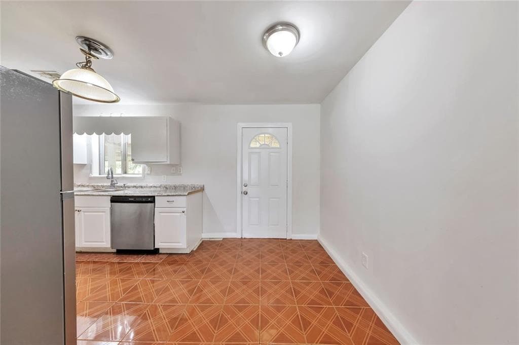 4 bedroom, 2 bathroom, 2,260 sq ft single family residence for sale at 6671 Pelican Court, Riverdale, GA 30274 — photo 9