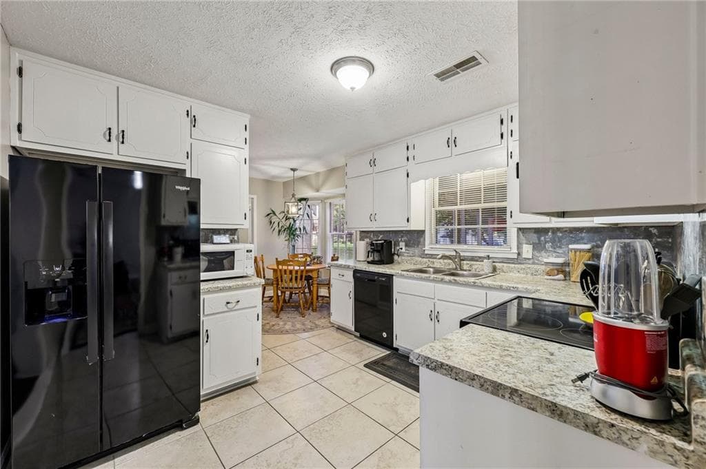 3 bedroom, 2 bathroom, 1,519 sq ft single family residence for sale at 3256 Village Glen Trail, Snellville, GA 30039 — photo 7