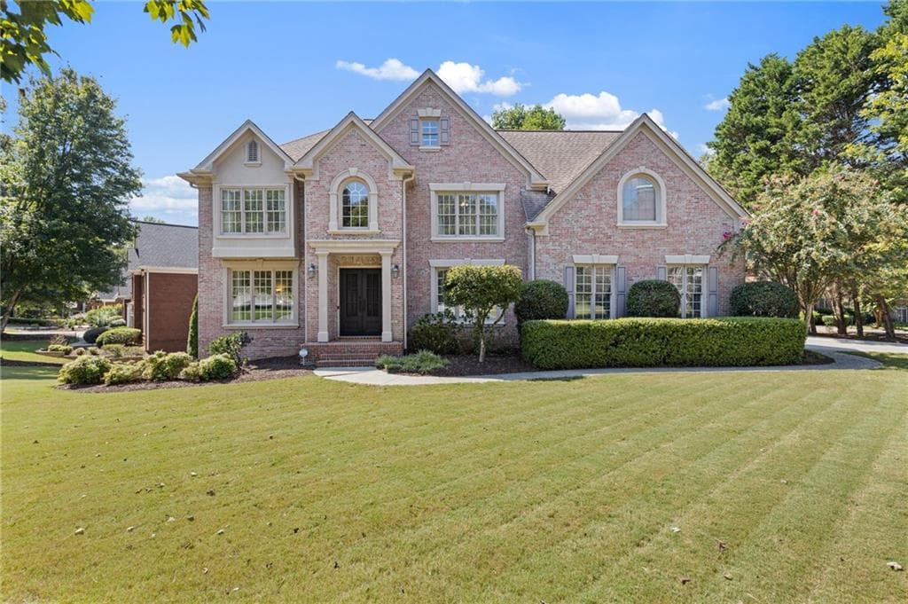 6 bedroom, 5 bathroom, 4,580 sq ft single family residence for sale at 700 Rose Creek Circle, Johns Creek, GA 30097