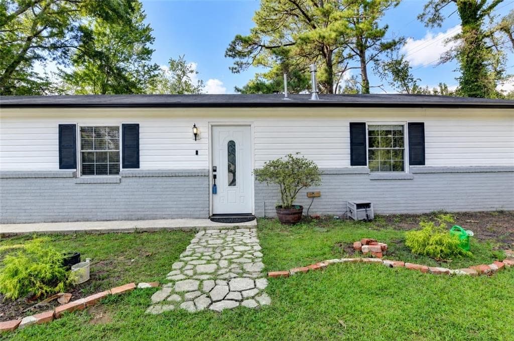 3 bedroom, 2 bathroom, 1,320 sq ft single family residence for sale at 4391 Bryant Drive, Lilburn, GA 30047 — photo 2