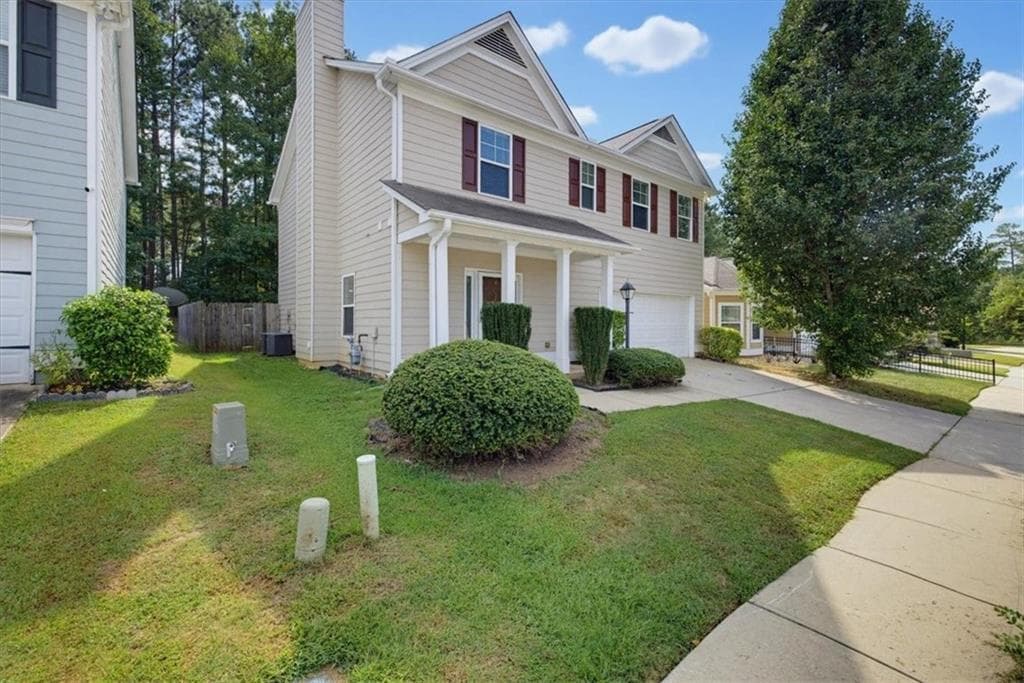 4 bedroom, 3 bathroom, 2,184 sq ft single family residence for sale at 50 Bellerive Lane, Covington, GA 30014 — photo 2