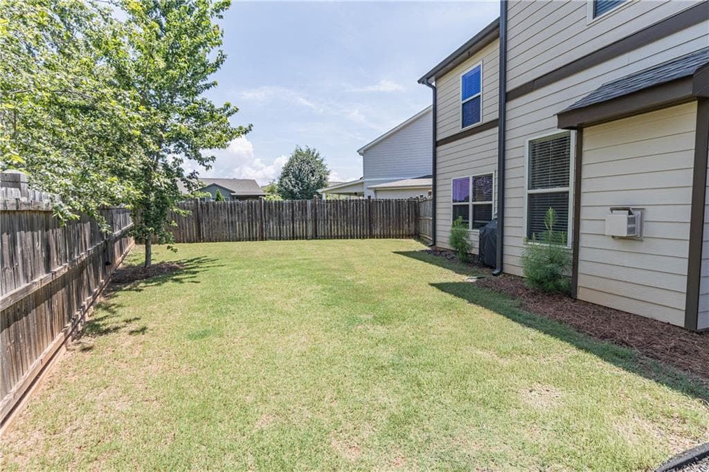 5 bedroom, 3 bathroom, 2,812 sq ft single family residence for sale at 5703 Shore Isle Court, Flowery Branch, GA 30542 — photo 5
