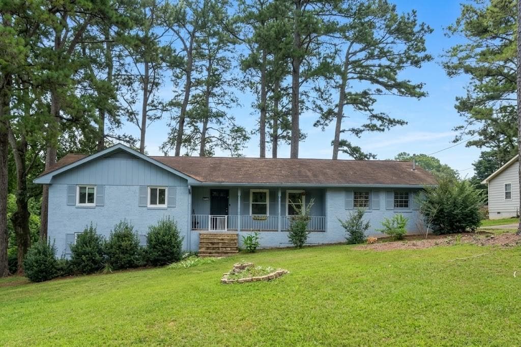 6 bedroom, 4 bathroom, 3,548 sq ft single family residence for sale at 2588 Kings Way, Lawrenceville, GA 30044 — photo 1 of 19