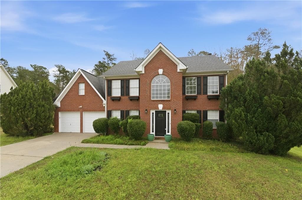 4 bedroom, 3 bathroom, 2,156 sq ft single family residence for sale at 9360 Carnes Crossing Circle, Jonesboro, GA 30236 — photo 2