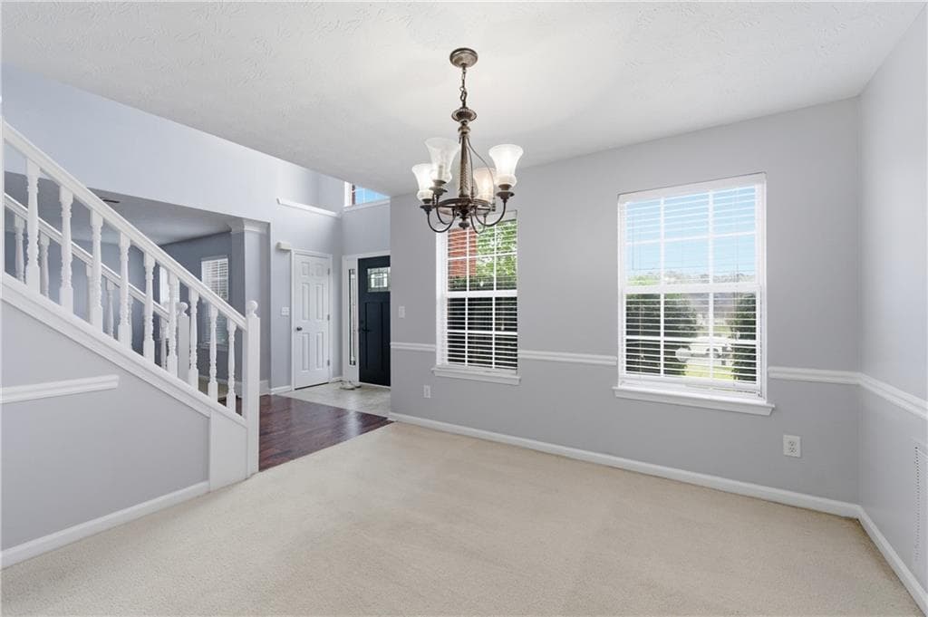 4 bedroom, 3 bathroom, 2,156 sq ft single family residence for sale at 9360 Carnes Crossing Circle, Jonesboro, GA 30236 — photo 4