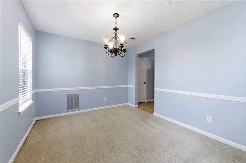 4 bedroom, 3 bathroom, 2,156 sq ft single family residence for sale at 9360 Carnes Crossing Circle, Jonesboro, GA 30236 — photo 5