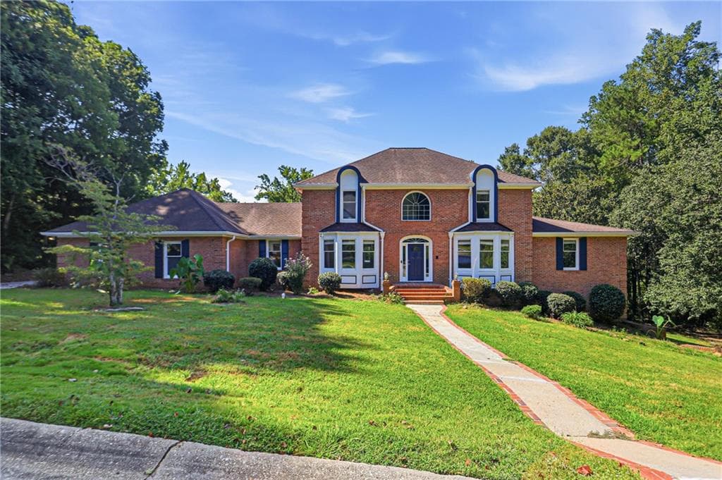 4 bedroom, 5 bathroom, 5,730 sq ft single family residence for sale at 1102 Timber Glen Court, Lilburn, GA 30047