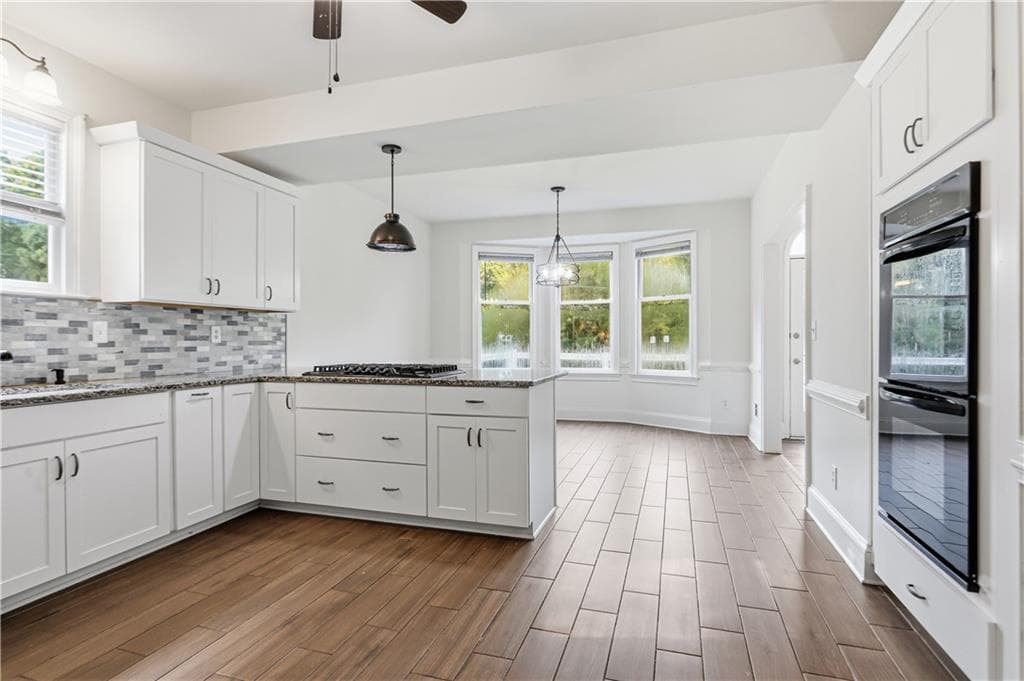 4 bedroom, 5 bathroom, 5,730 sq ft single family residence for sale at 1102 Timber Glen Court, Lilburn, GA 30047 — photo 2