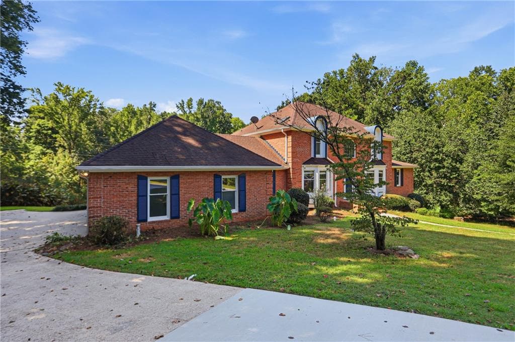 4 bedroom, 5 bathroom, 5,730 sq ft single family residence for sale at 1102 Timber Glen Court, Lilburn, GA 30047 — photo 6