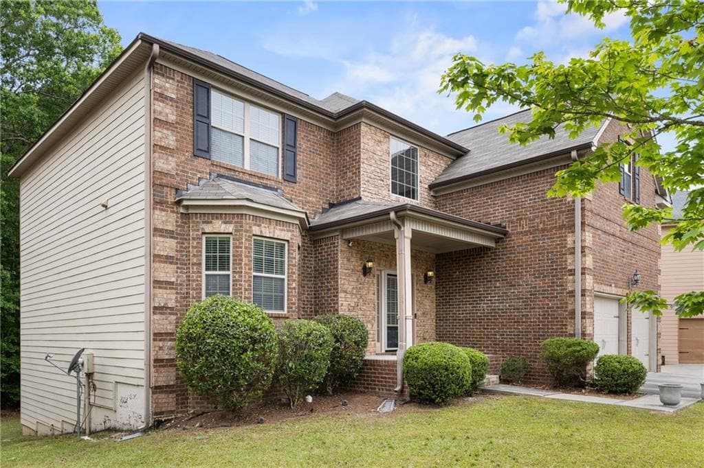 4 bedroom, 3 bathroom, 3,379 sq ft single family residence for sale at 3876 Margaux Drive, Atlanta, GA 30349 — photo 2