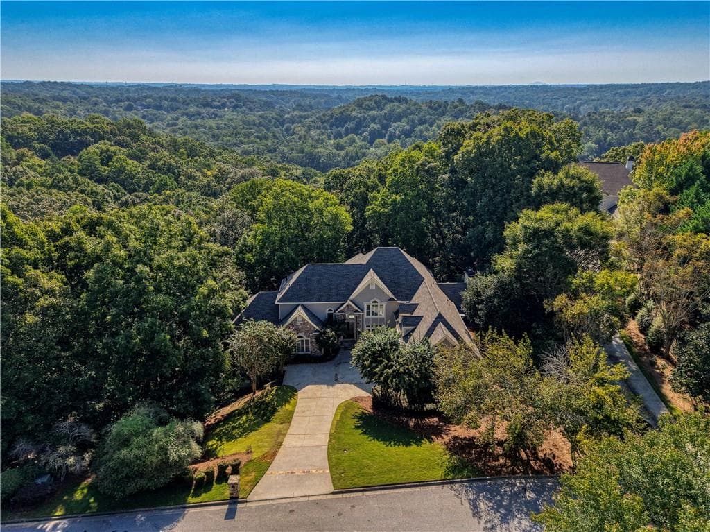 5 bedroom, 6 bathroom, 8,055 sq ft single family residence for sale at 8370 Sentinae Chase Drive, Roswell, GA 30076
