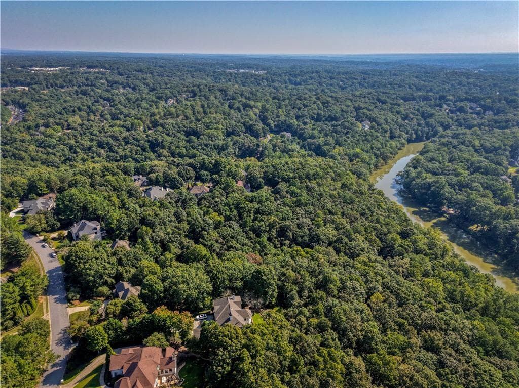 5 bedroom, 6 bathroom, 8,055 sq ft single family residence for sale at 8370 Sentinae Chase Drive, Roswell, GA 30076 — photo 2