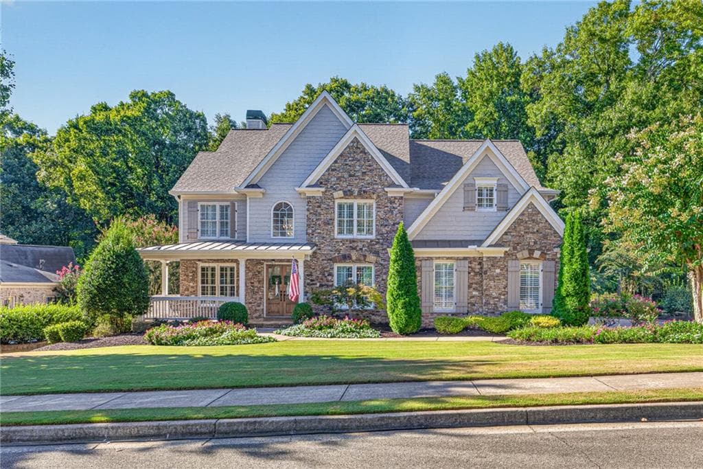 6 bedroom, 5 bathroom, 5,075 sq ft single family residence for sale at 3075 Corsair Curve, Cumming, GA 30040 — photo 2