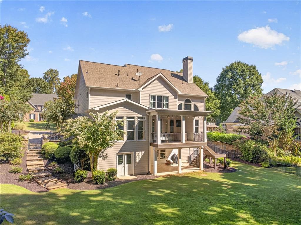 6 bedroom, 5 bathroom, 5,075 sq ft single family residence for sale at 3075 Corsair Curve, Cumming, GA 30040 — photo 4