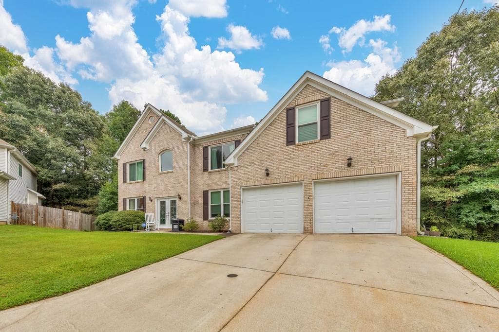 4 bedroom, 3 bathroom, 3,730 sq ft single family residence for sale at 7165 Blair Chase Court, Austell, GA 30168 — photo 2