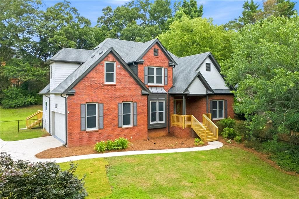 5 bedroom, 3 bathroom, 3,554 sq ft single family residence for sale at 3580 Chartwell Boulevard, Suwanee, GA 30024 — photo 1 of 50