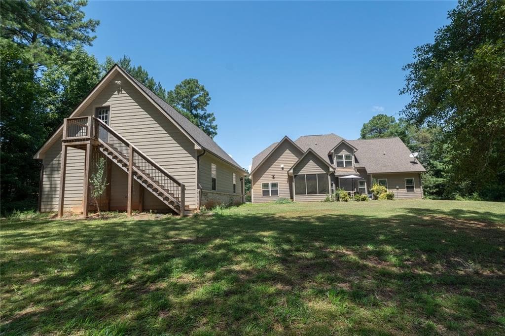 6 bedroom, 4 bathroom, 3,549 sq ft single family residence for sale at 155 Chantilly Lane, Fayetteville, GA 30215 — photo 2