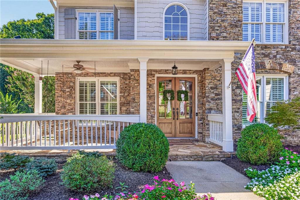 6 bedroom, 5 bathroom, 5,075 sq ft single family residence for sale at 3075 Corsair Curve, Cumming, GA 30040 — photo 5