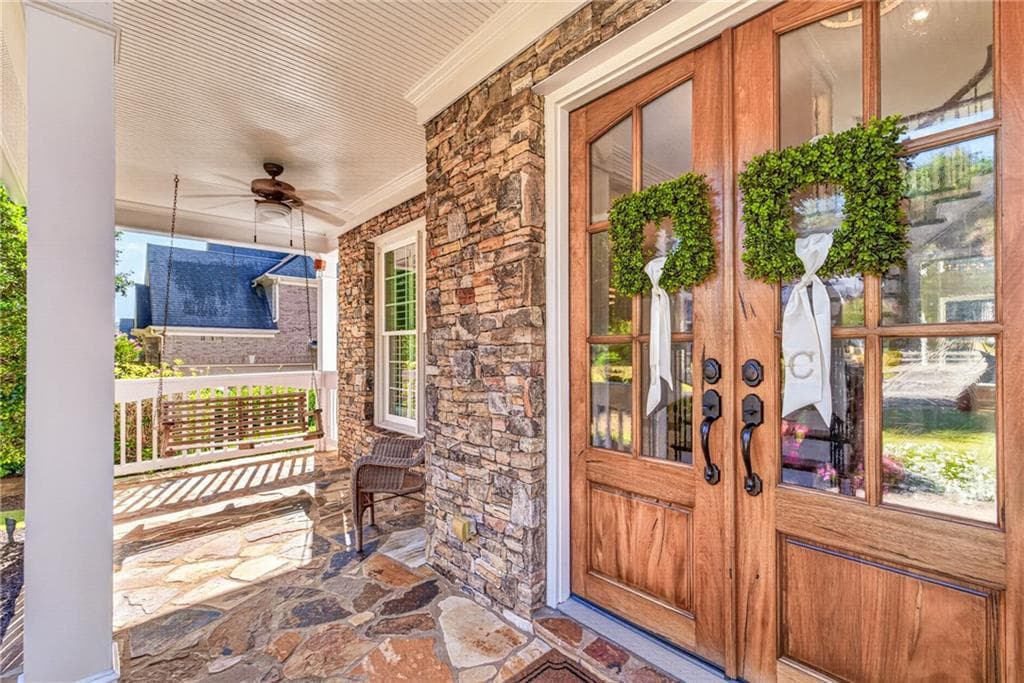6 bedroom, 5 bathroom, 5,075 sq ft single family residence for sale at 3075 Corsair Curve, Cumming, GA 30040 — photo 6
