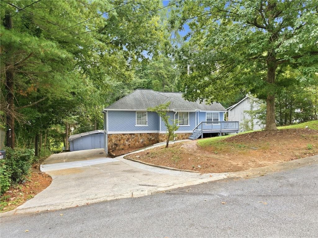 5 bedroom, 3 bathroom, 2,540 sq ft single family residence for sale at 5280 Nathan Drive, Lilburn, GA 30047 — photo 4
