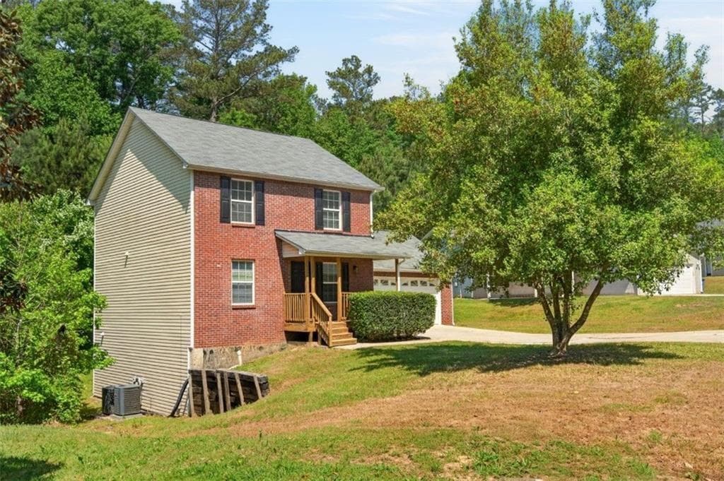 5 bedroom, 4 bathroom, 2,242 sq ft single family residence for sale at 1424 Steam Engine Way, Conyers, GA 30013 — photo 7