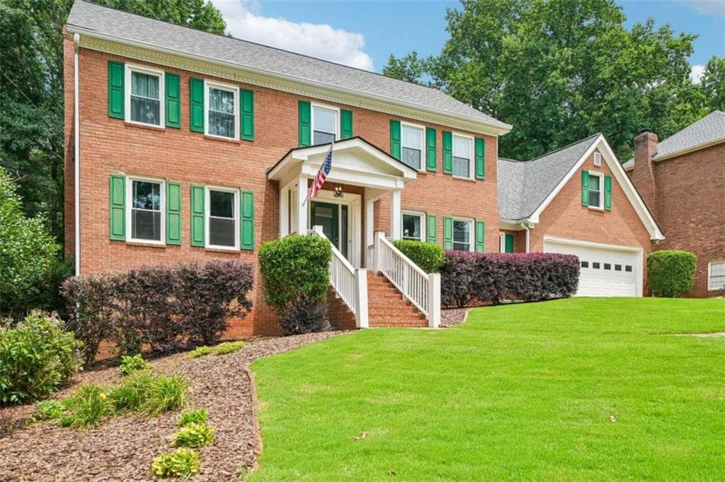 5 bedroom, 4 bathroom, 3,306 sq ft single family residence for sale at 1184 Staples Drive, Lilburn, GA 30047 — photo 2