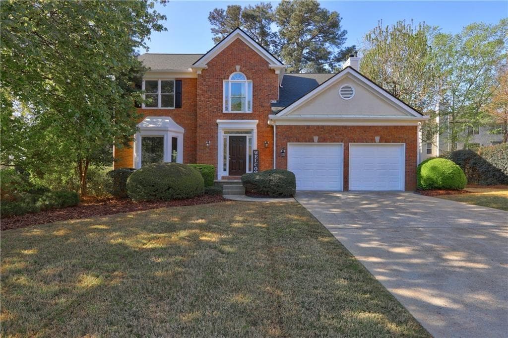 4 bedroom, 3 bathroom, 2,174 sq ft home for sale at 7140 Collingsworth Place, Cumming, GA