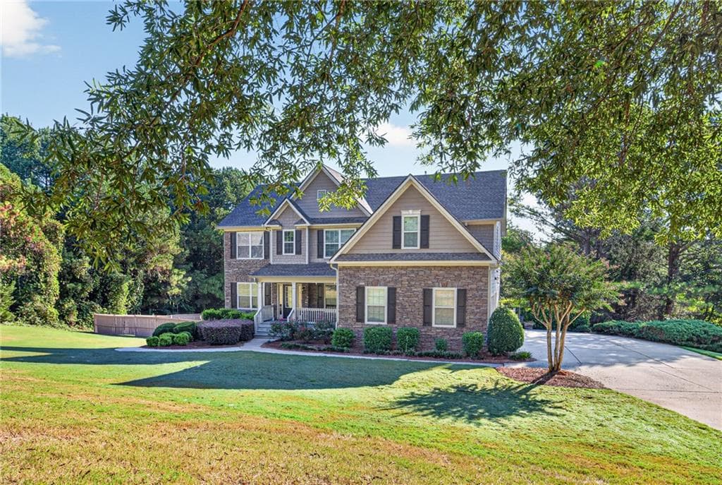 5 bedroom, 4 bathroom, 4,684 sq ft single family residence for sale at 1664 Maes Overlook, Loganville, GA 30052 — photo 2