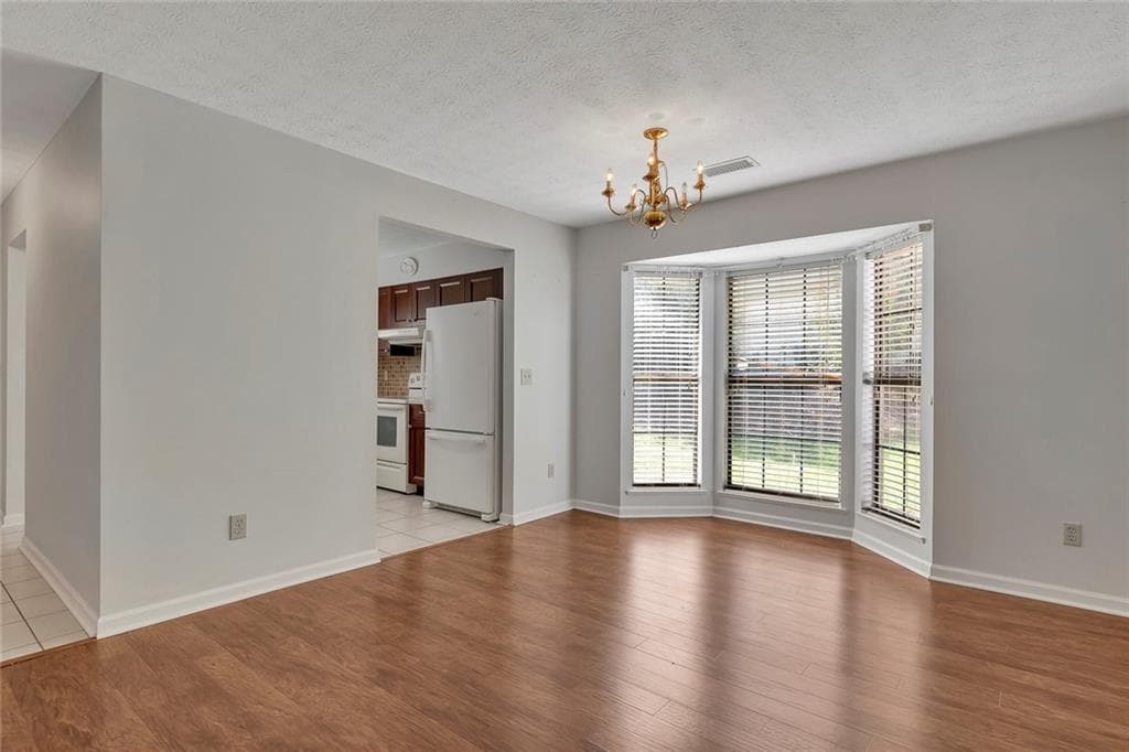 2 bedroom, 2 bathroom, 1,224 sq ft townhouse for sale at 5189 Village Green Way, Alpharetta, GA 30009 — photo 4