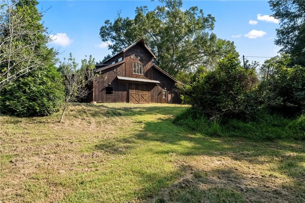 3 bedroom, 2 bathroom, 2,500 sq ft single family residence for sale at 1060 Birmingham Road, Milton, GA 30004 — photo 4