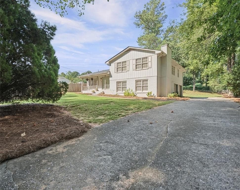 4 bedroom, 3 bathroom, 2,249 sq ft single family residence for sale at 3167 Mountain Creek Lane, Roswell, GA 30075 — photo 4