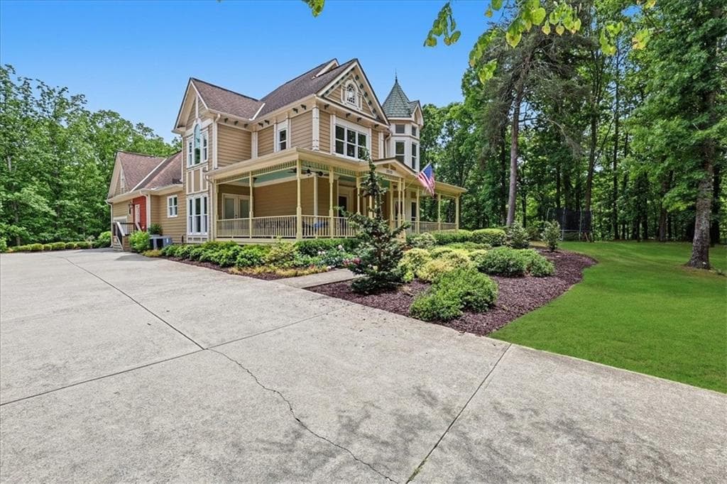4 bedroom, 5 bathroom, 5,338 sq ft single family residence for sale at 3515 S Puckett Road, Buford, GA 30519 — photo 3