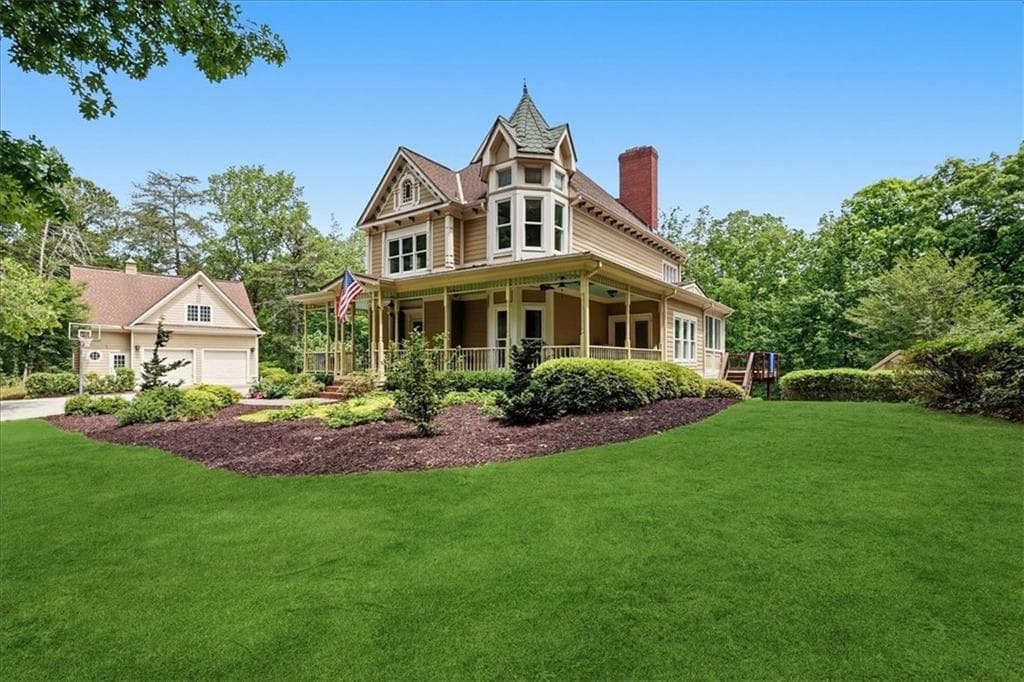 4 bedroom, 5 bathroom, 5,338 sq ft single family residence for sale at 3515 S Puckett Road, Buford, GA 30519 — photo 4