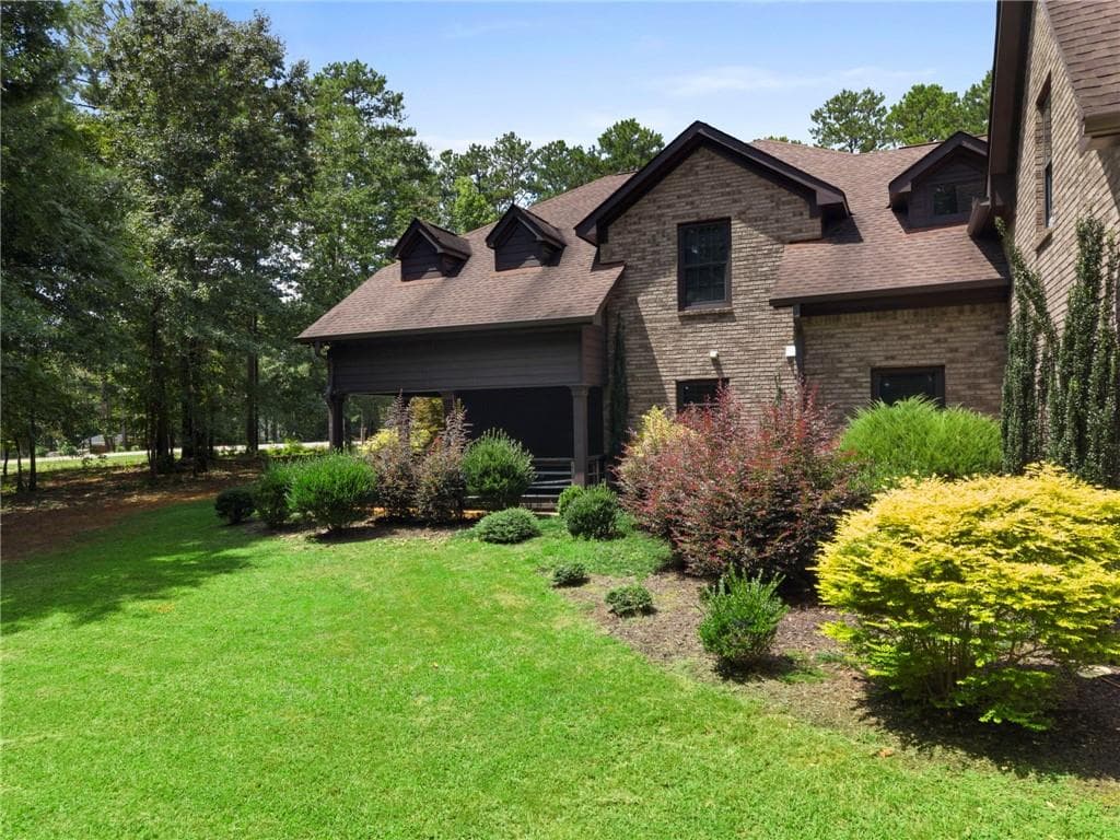 8 bedroom, 8 bathroom, 7,160 sq ft single family residence for sale at 106 Big Buck Court, Jackson, GA 30233 — photo 2