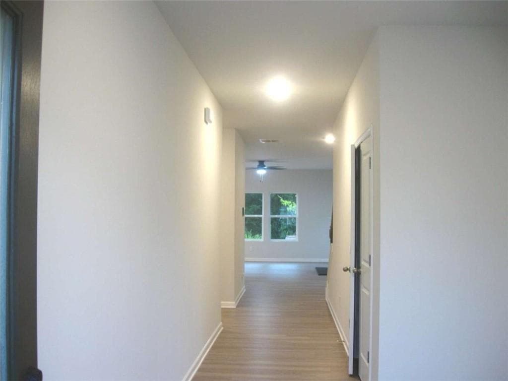 4 bedroom, 3 bathroom, 2,565 sq ft single family residence for sale at 11854 Rizvan Place, Covington, GA 30014 — photo 2
