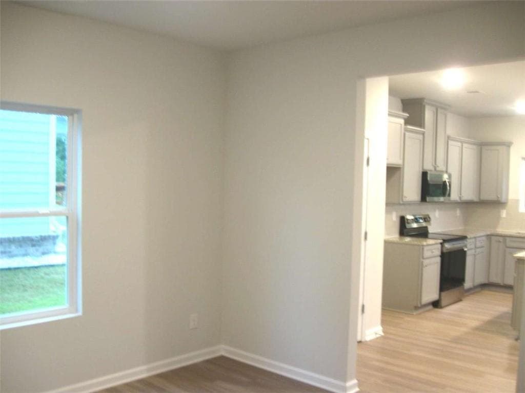 4 bedroom, 3 bathroom, 2,565 sq ft single family residence for sale at 11854 Rizvan Place, Covington, GA 30014 — photo 8