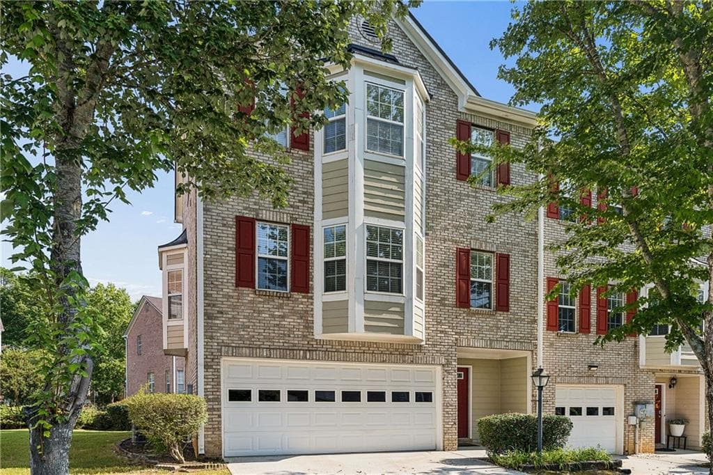 3 bedroom, 3 bathroom, 1,828 sq ft townhouse for sale at 2223 Mill Garden Place, Buford, GA 30519