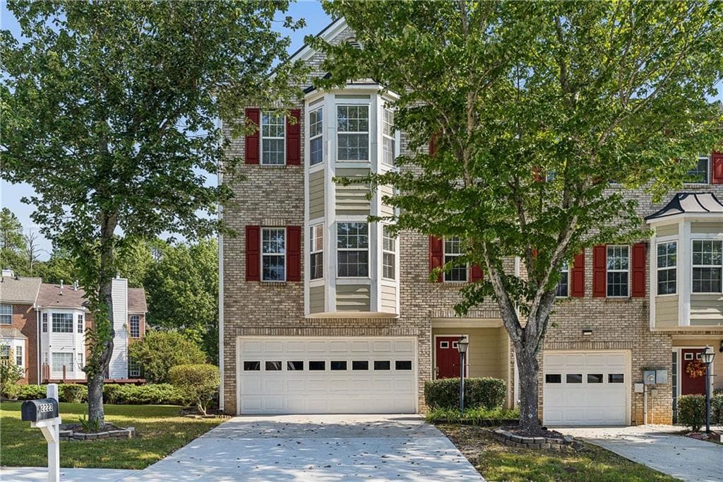 3 bedroom, 3 bathroom, 1,828 sq ft townhouse for sale at 2223 Mill Garden Place, Buford, GA 30519 — photo 2