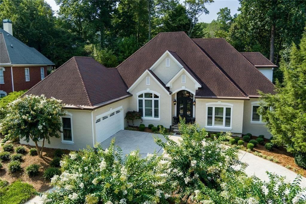 4 bedroom, 4 bathroom, 6,233 sq ft single family residence for sale at 1671 Tyler Green Trail, Smyrna, GA 30080