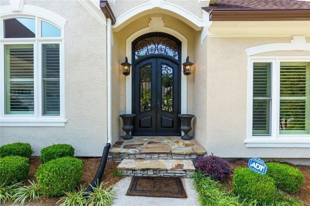 4 bedroom, 4 bathroom, 6,233 sq ft single family residence for sale at 1671 Tyler Green Trail, Smyrna, GA 30080 — photo 2