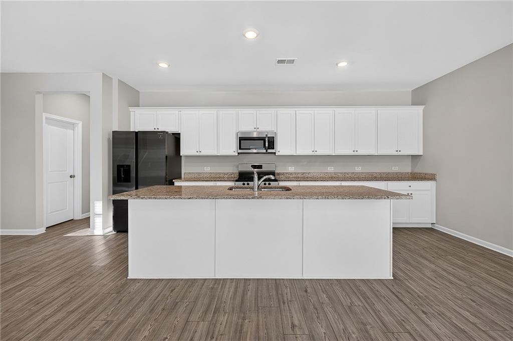 4 bedroom, 3 bathroom, 2,500 sq ft single family residence for sale at 323 Golden Eagle Parkway, Braselton, GA 30517 — photo 9