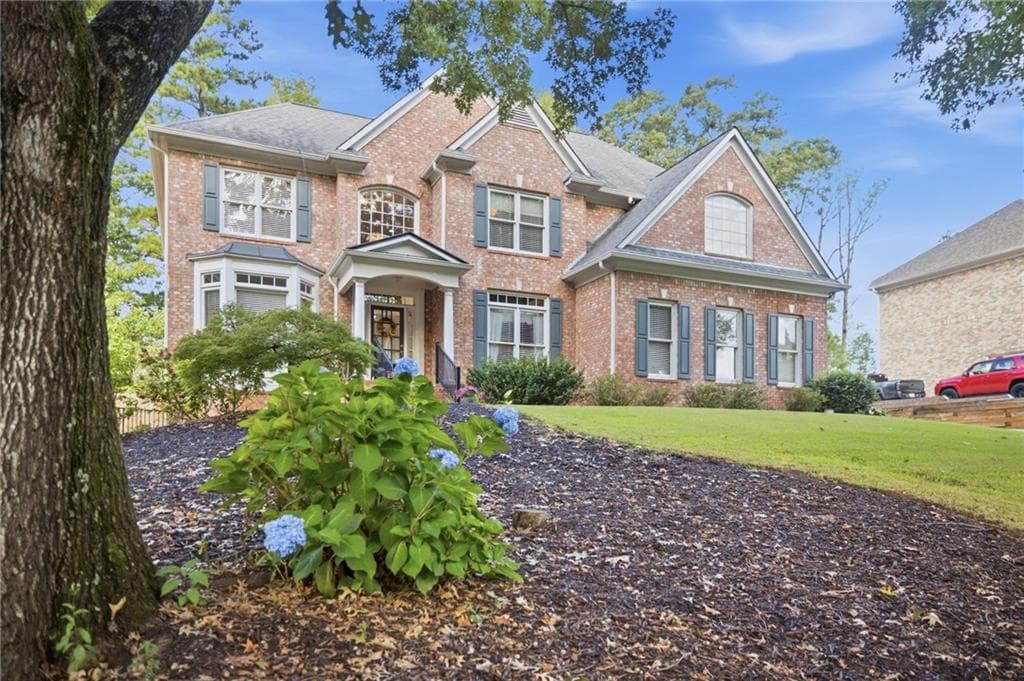 5 bedroom, 4 bathroom, 2,885 sq ft single family residence for sale at 5930 Westcroft Lane, Cumming, GA 30040 — photo 2