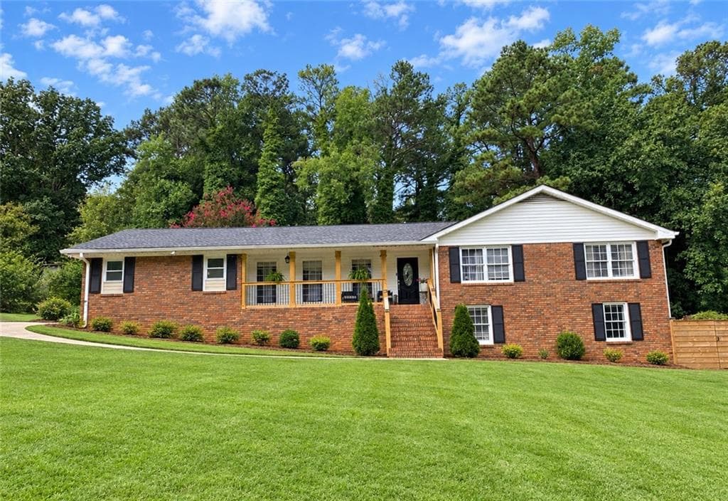 4 bedroom, 2 bathroom, 25,265 sq ft single family residence for sale at 2323 Cambridge Street, Snellville, GA 30078 — photo 2