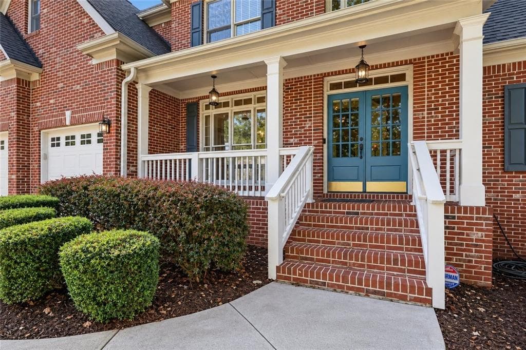 5 bedroom, 4 bathroom, 4,130 sq ft single family residence for sale at 5370 Avonshire Lane, Cumming, GA 30040 — photo 3