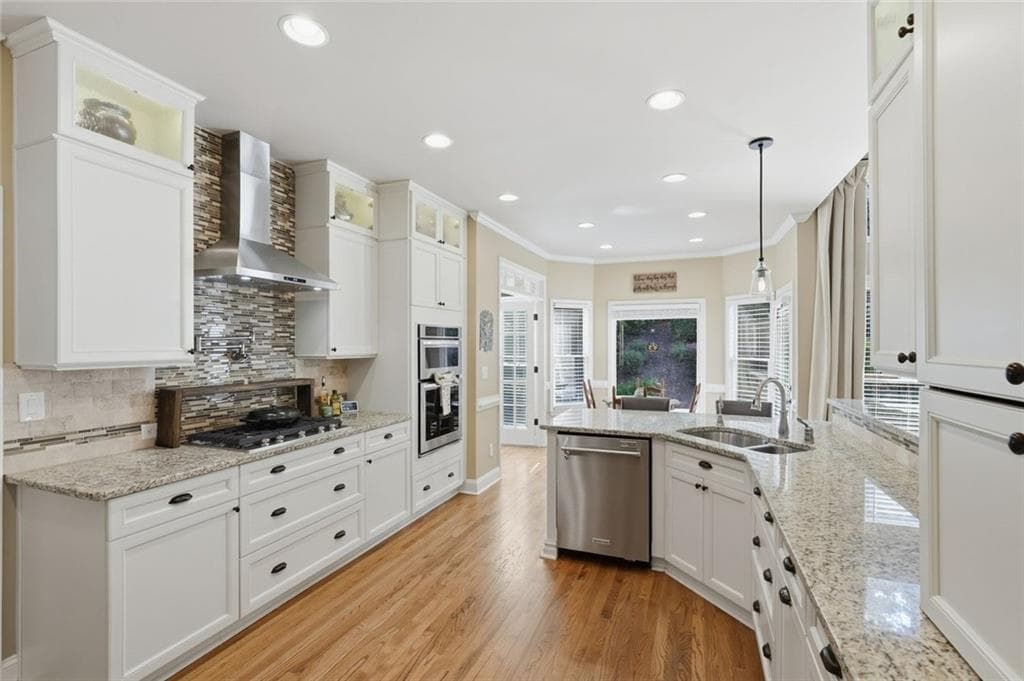 5 bedroom, 4 bathroom, 4,130 sq ft single family residence for sale at 5370 Avonshire Lane, Cumming, GA 30040 — photo 9