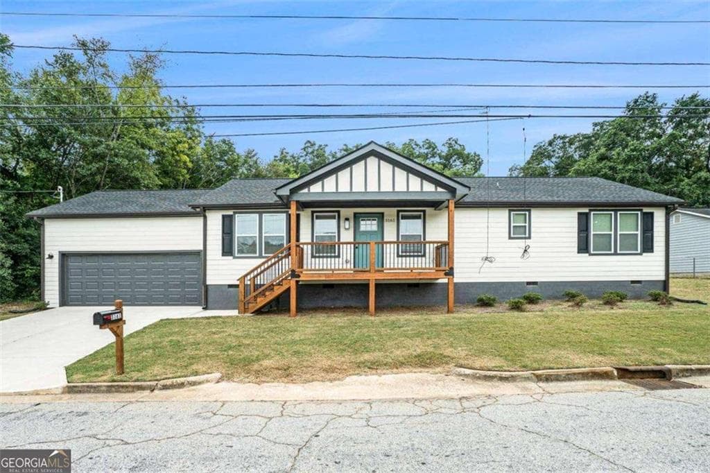 3 bedroom, 2 bathroom, 1,404 sq ft single family residence for sale at 3161 Stone Mountain Street, Covington, GA 30014 — photo 2
