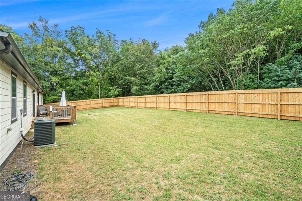 3 bedroom, 2 bathroom, 1,404 sq ft single family residence for sale at 3161 Stone Mountain Street, Covington, GA 30014 — photo 5