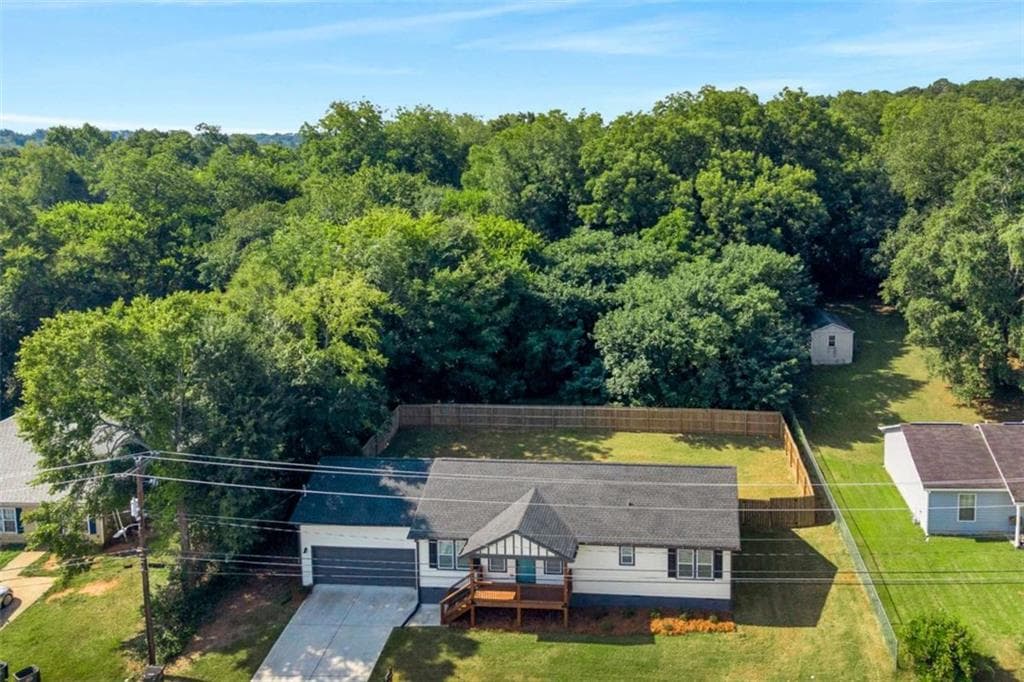 3 bedroom, 2 bathroom, 1,404 sq ft single family residence for sale at 3161 Stone Mountain Street, Covington, GA 30014 — photo 3