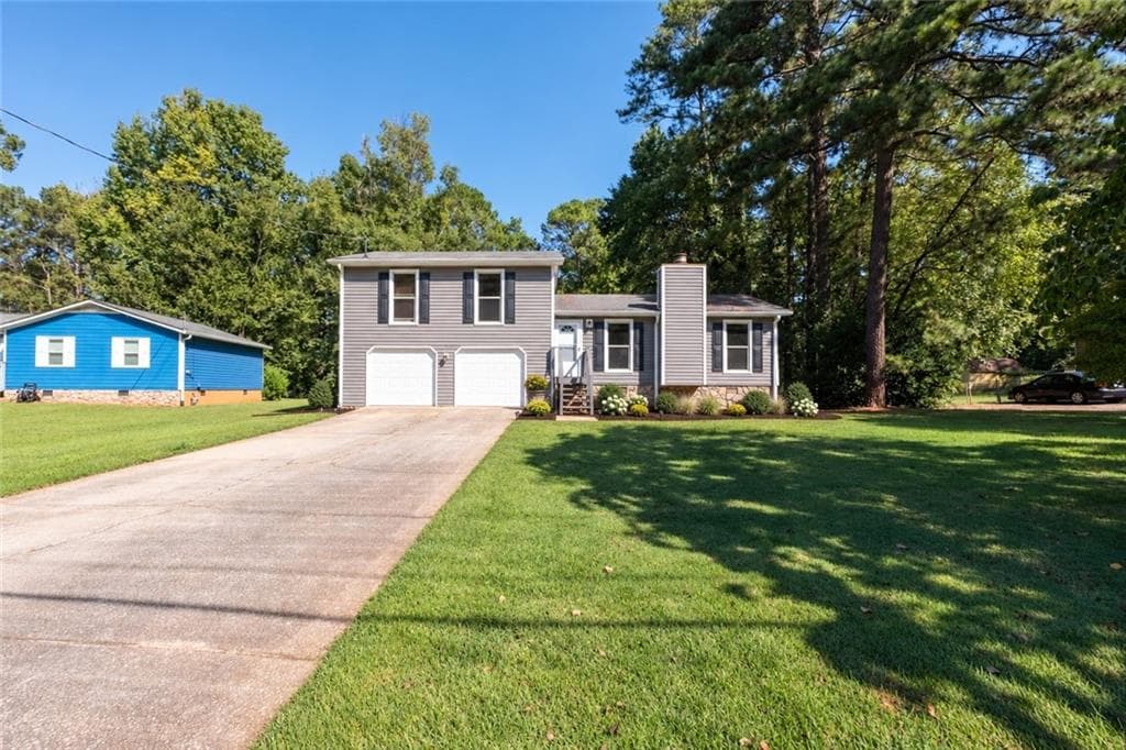 3 bedroom, 2 bathroom, 1,348 sq ft single family residence for sale at 1119 Blazing Ridge, Lawrenceville, GA 30046 — photo 2