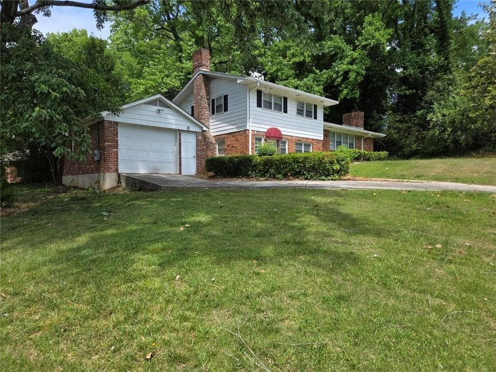 4 bedroom, 2 bathroom, 1,621 sq ft single family residence for sale at 1037 Mell Avenue, Clarkston, GA 30021 — photo 2
